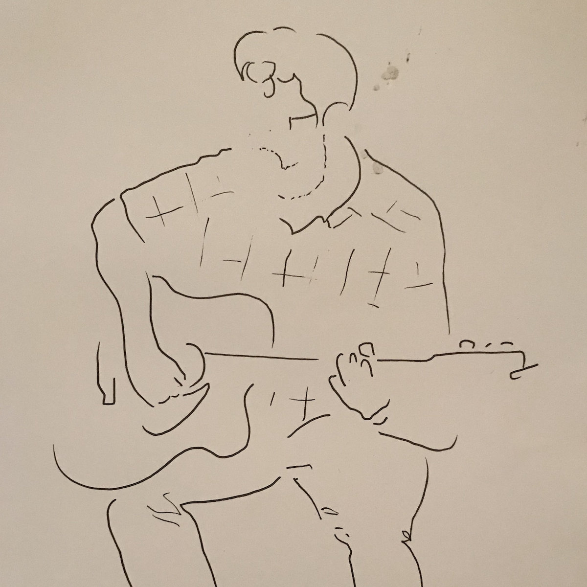 A sketch of soneone playing an acoustic guitar