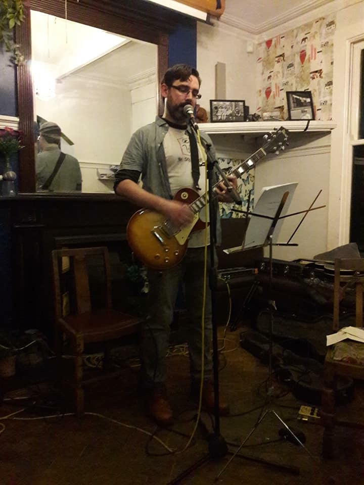 My playin guitar at the Old Abbey Tap House in Manchester
